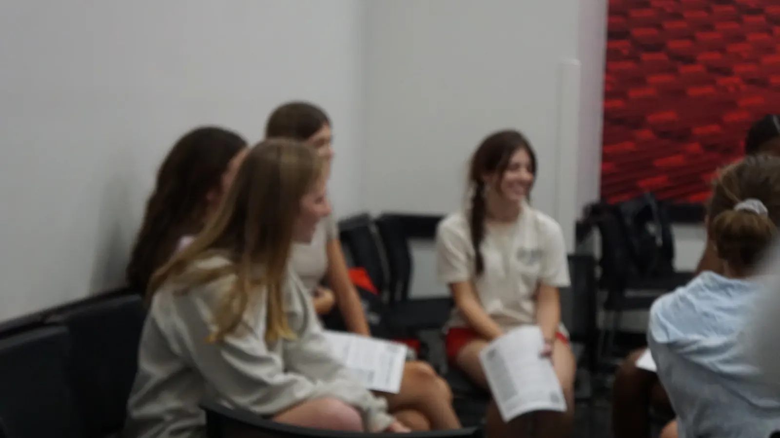 Freshmen listening and talking together in a small group