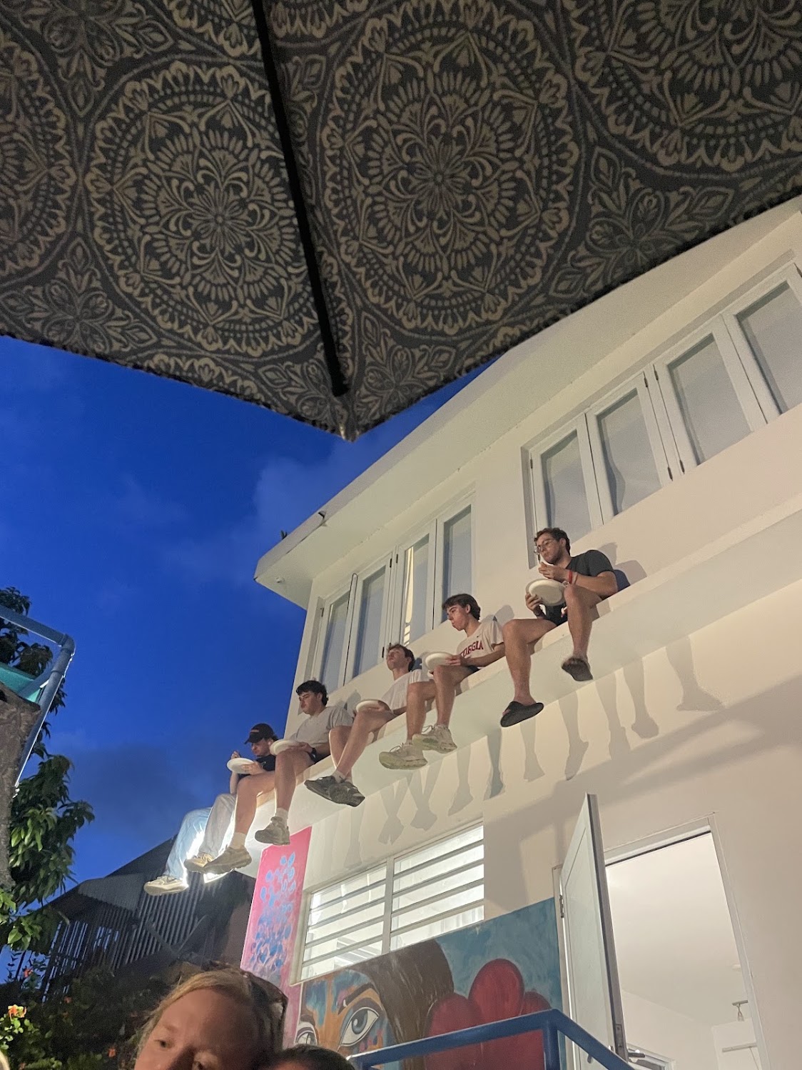 Students relaxing together on a rooftop in Puerto Rico