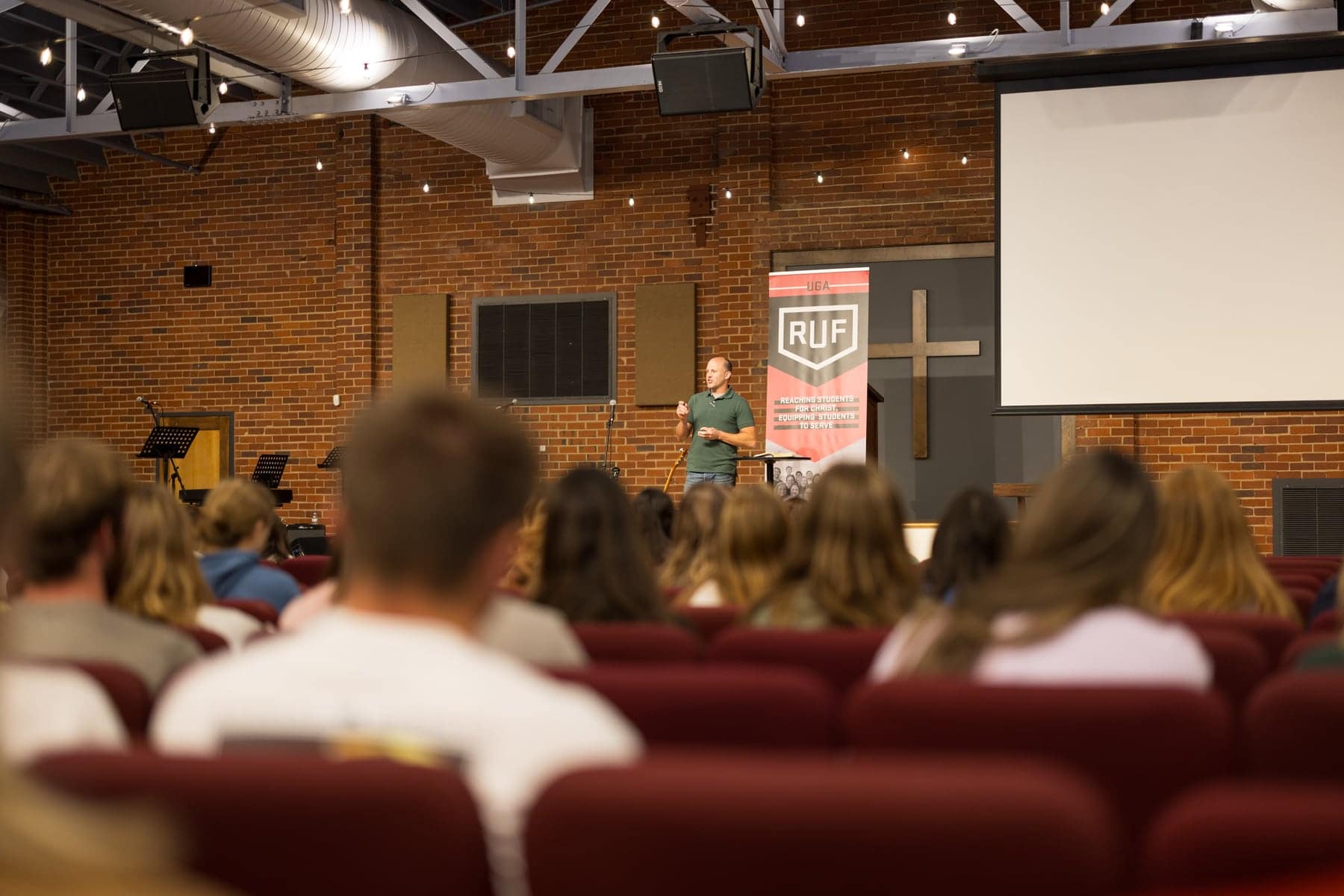 Students listening during the first Large Group of the year