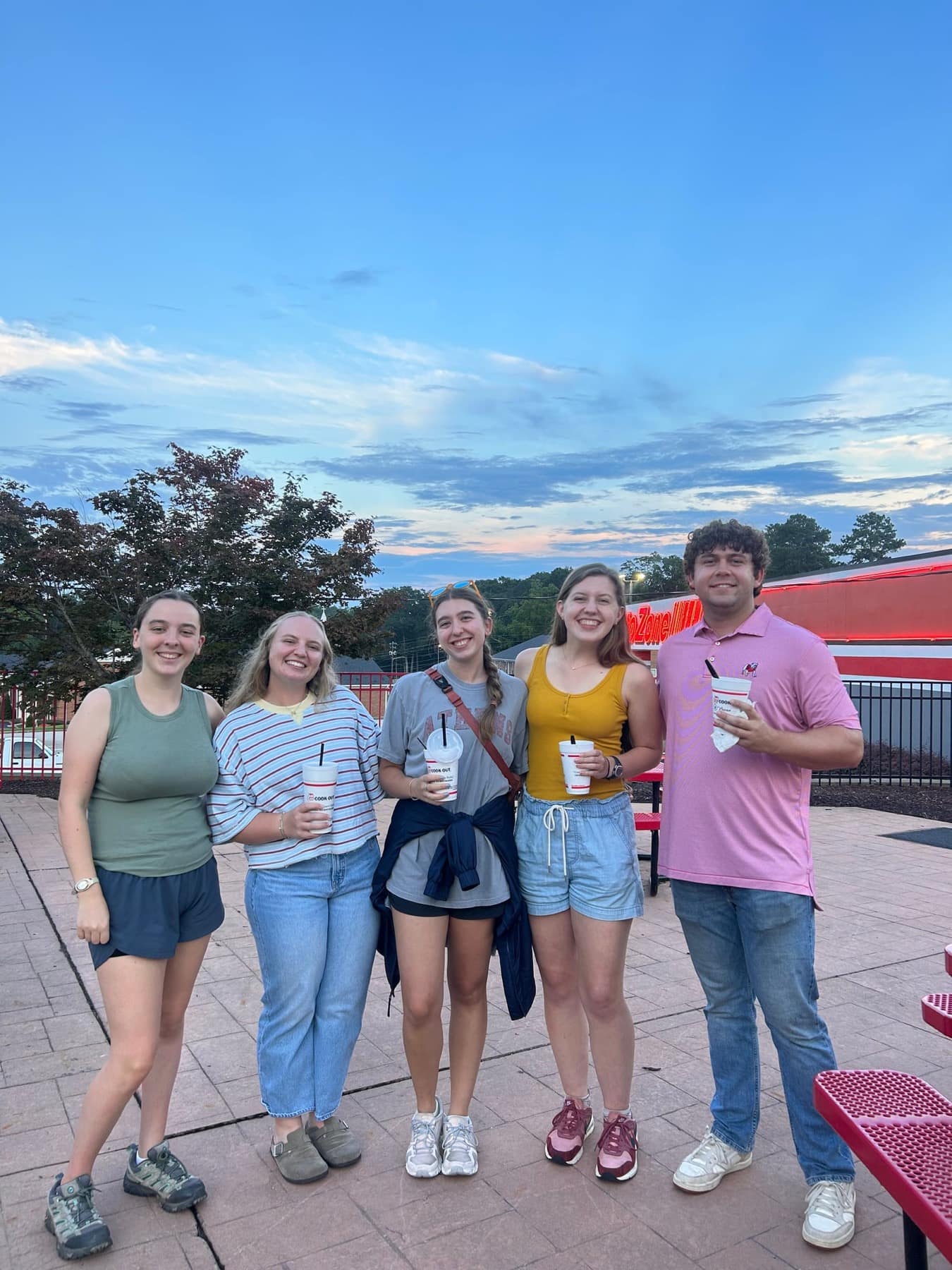 Friends smiling together while exploring Athens restaurants